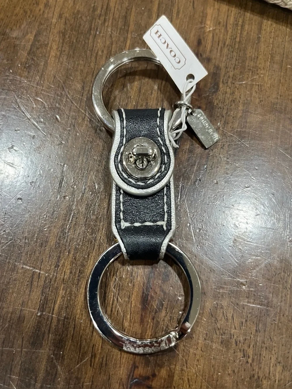 Coach Men’s Black Leather Keychain with Silver Hardware